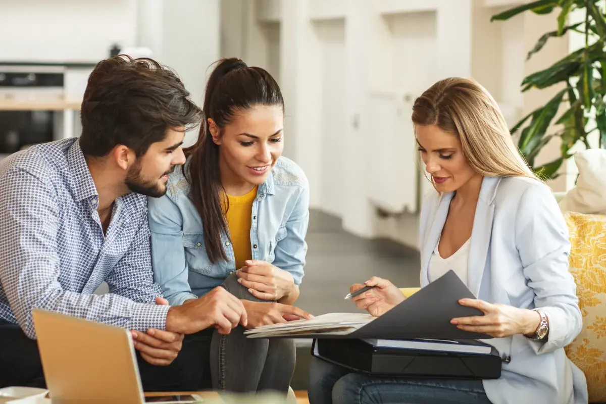 Agent showing policy to homeowners
